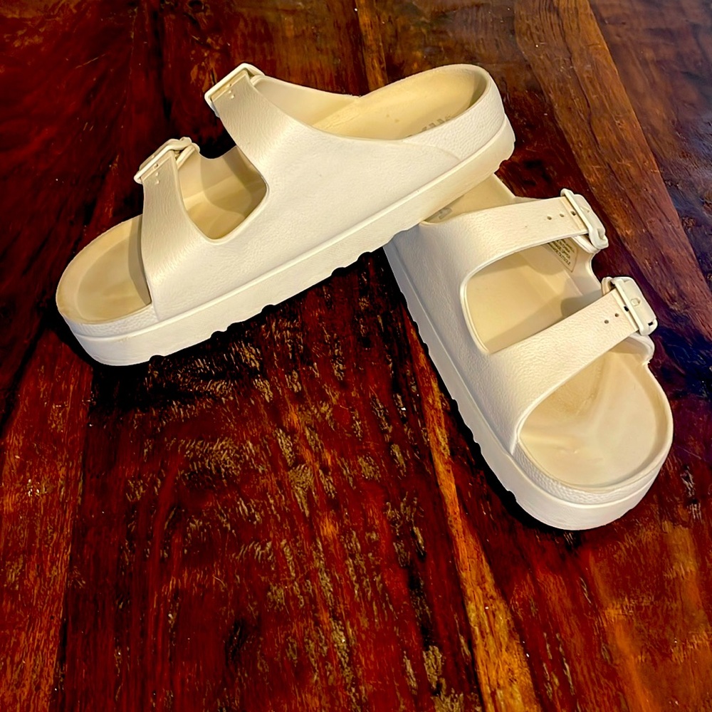 Mia platform slides in a cream color